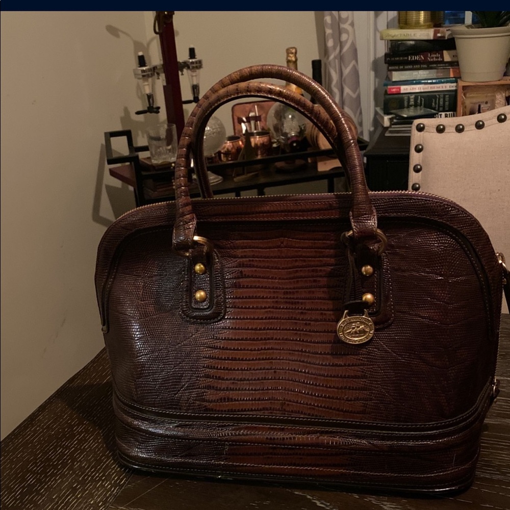 Lightly used still perfect condition beautiful gator leather bag